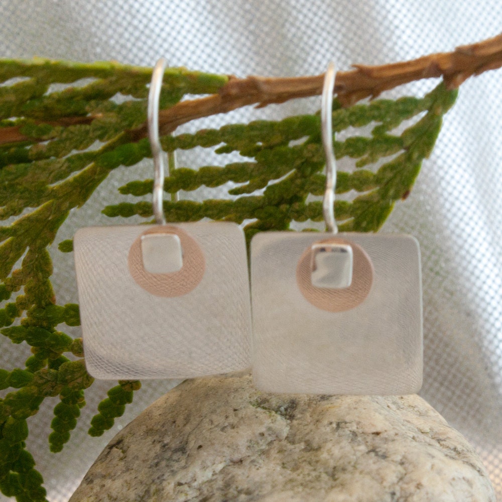 A modern pair of sterling silver and 14k rose gold earrings, gift, her, woman, girl