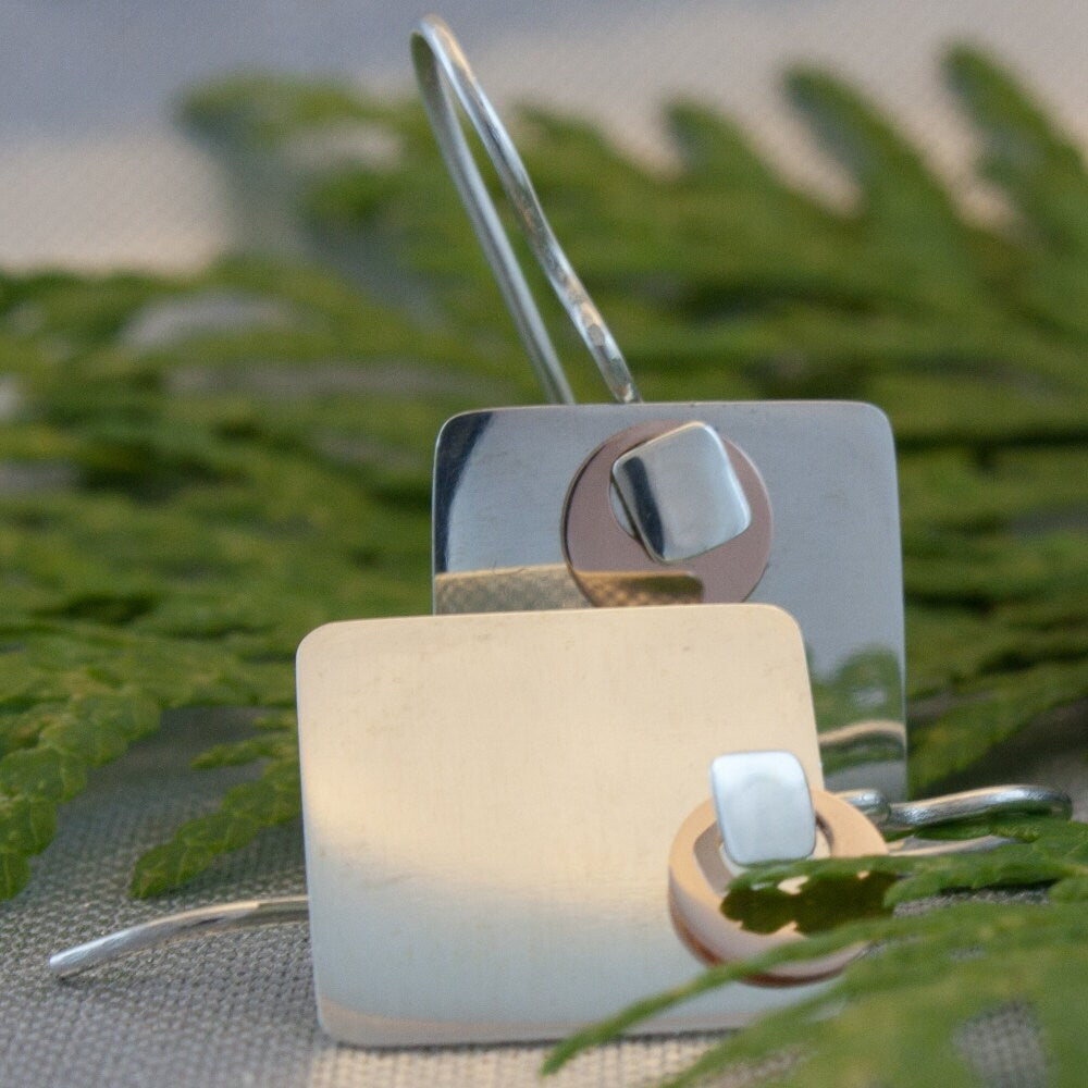 A modern pair of sterling silver and 14k rose gold earrings, gift, her, woman, girl
